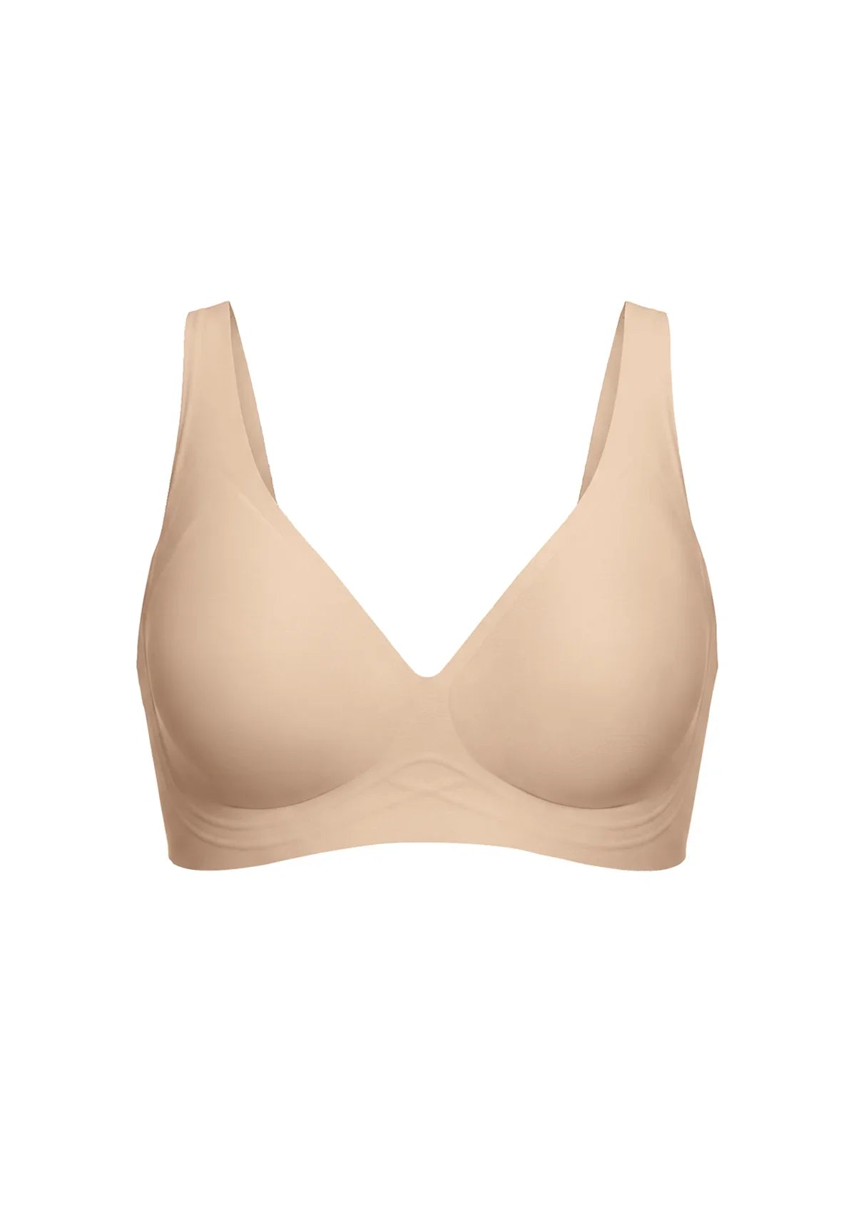 A seamless, wireless bra in a light beige nude color, shown against a plain white background.