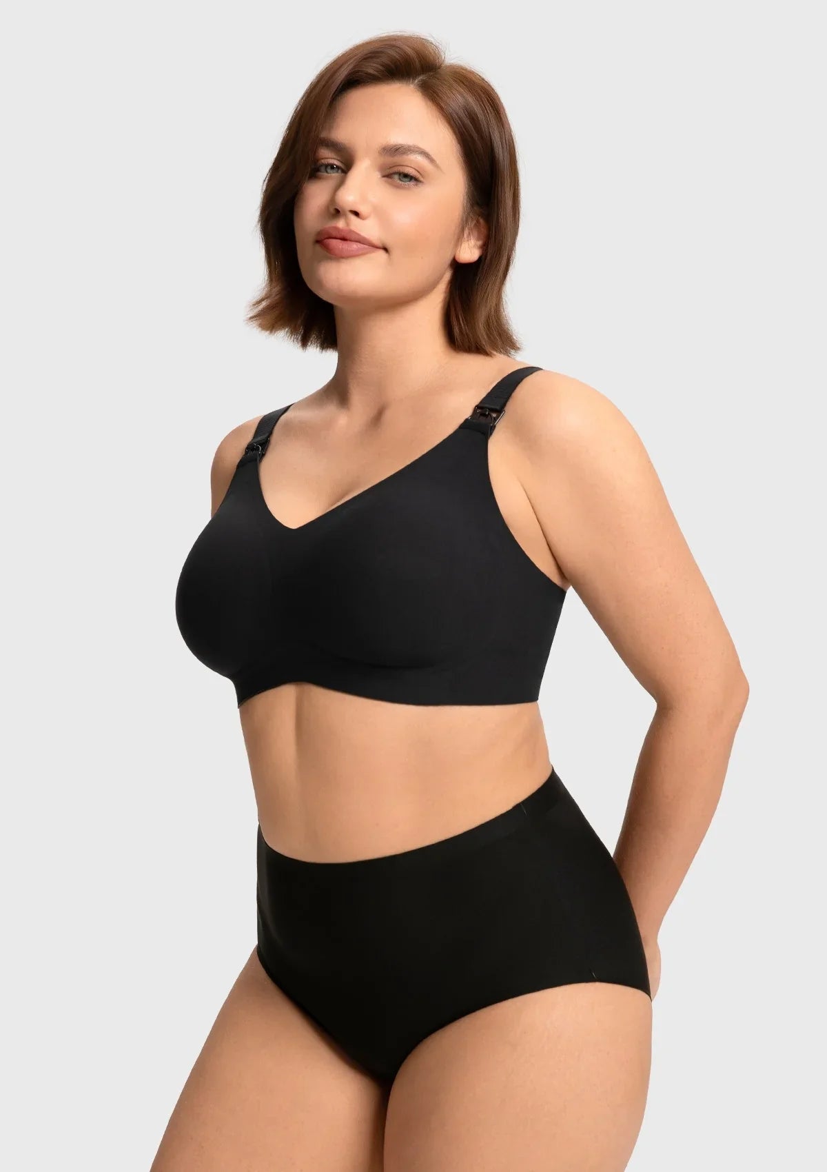 Side profile of the black nursing bra with Jelly Support Technology, highlighting the breathable side lift panels that prevent bulges and provide a natural lift.
