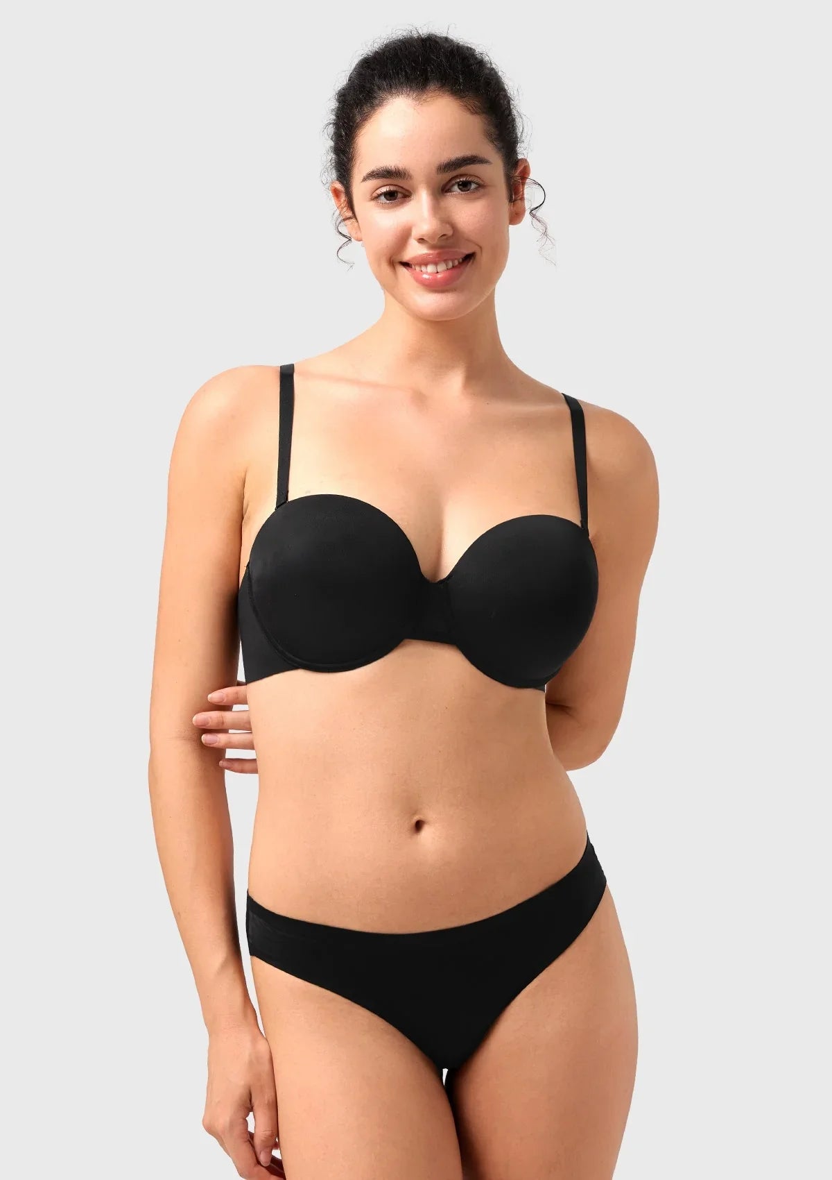 Front view of the black multiway underwire bra with traditional straps attached, offering comfortable and secure push-up support for daily wear.