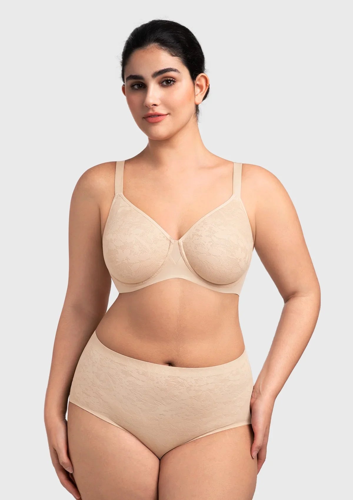 Front view of the nude seamless lace full coverage bra, showcasing an invisible fit and elegant molded cups for everyday comfort.