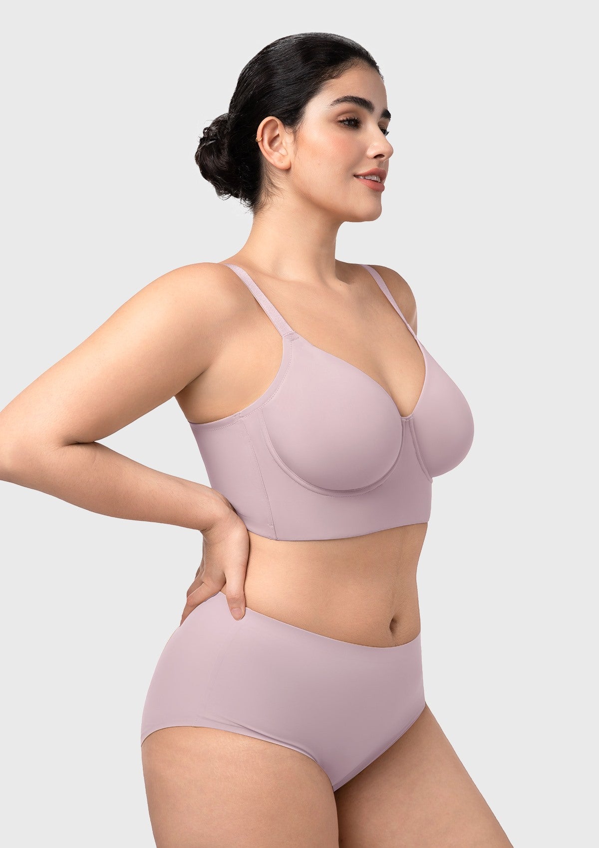 Detailed side view of the gray purple bra during movement, highlighting the comfortable fit that won't dig in or ride up.