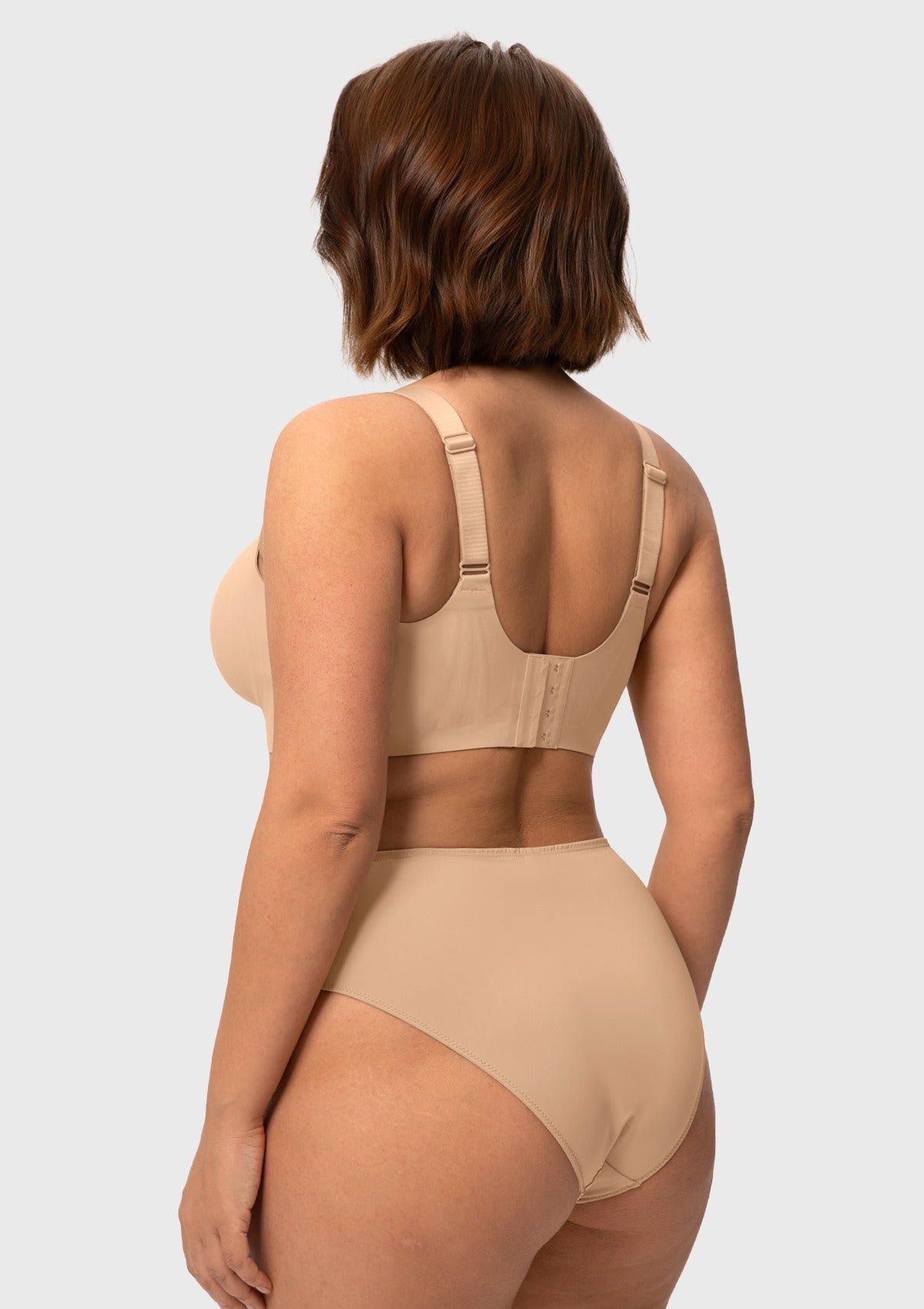 Back view of the Light Beige wireless bra, highlighting the 3cm adjustable wide non-slip straps that distribute pressure evenly for all-day comfort.