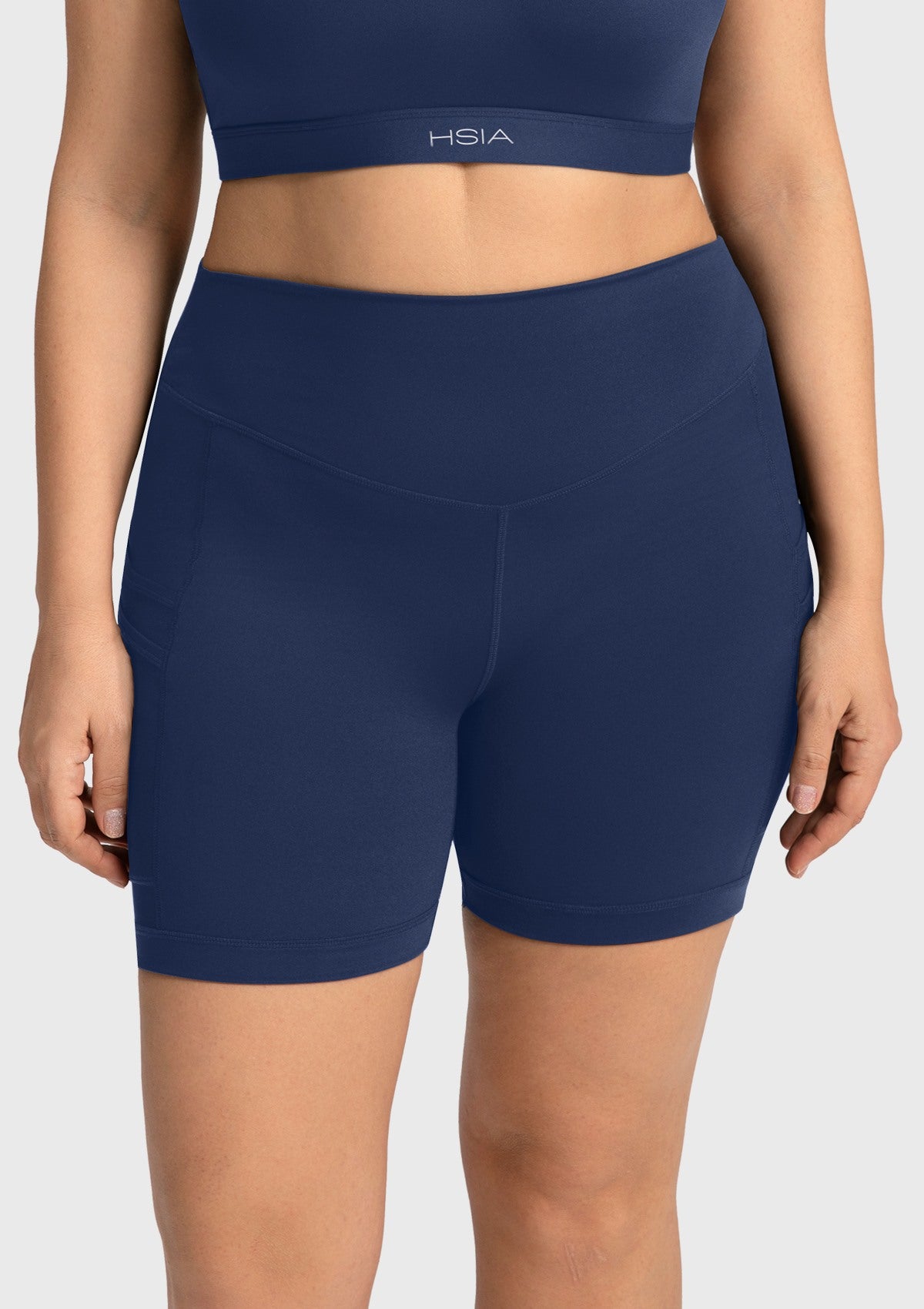 Full front view of the navy blue athletic shorts, offering a highly stretchy, comfortable fit that is plus size friendly up to 4XL.