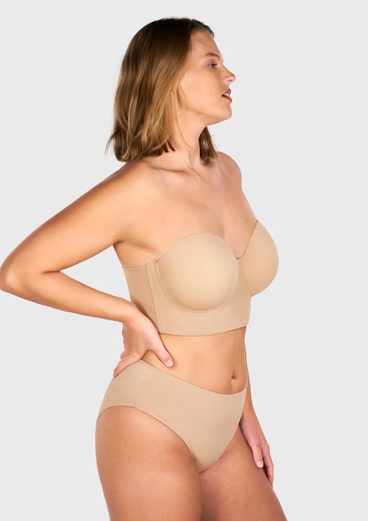 Three-quarter view of the nude lightly lined bra for heavy breasts, providing excellent side containment without digging in.