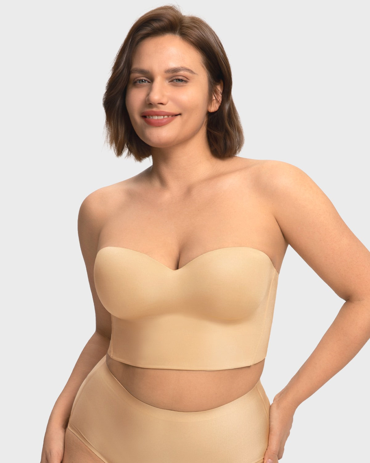 Front view of the HSIA nude seamless strapless corset bra, providing a flawless and invisible foundation under form-fitting clothing.