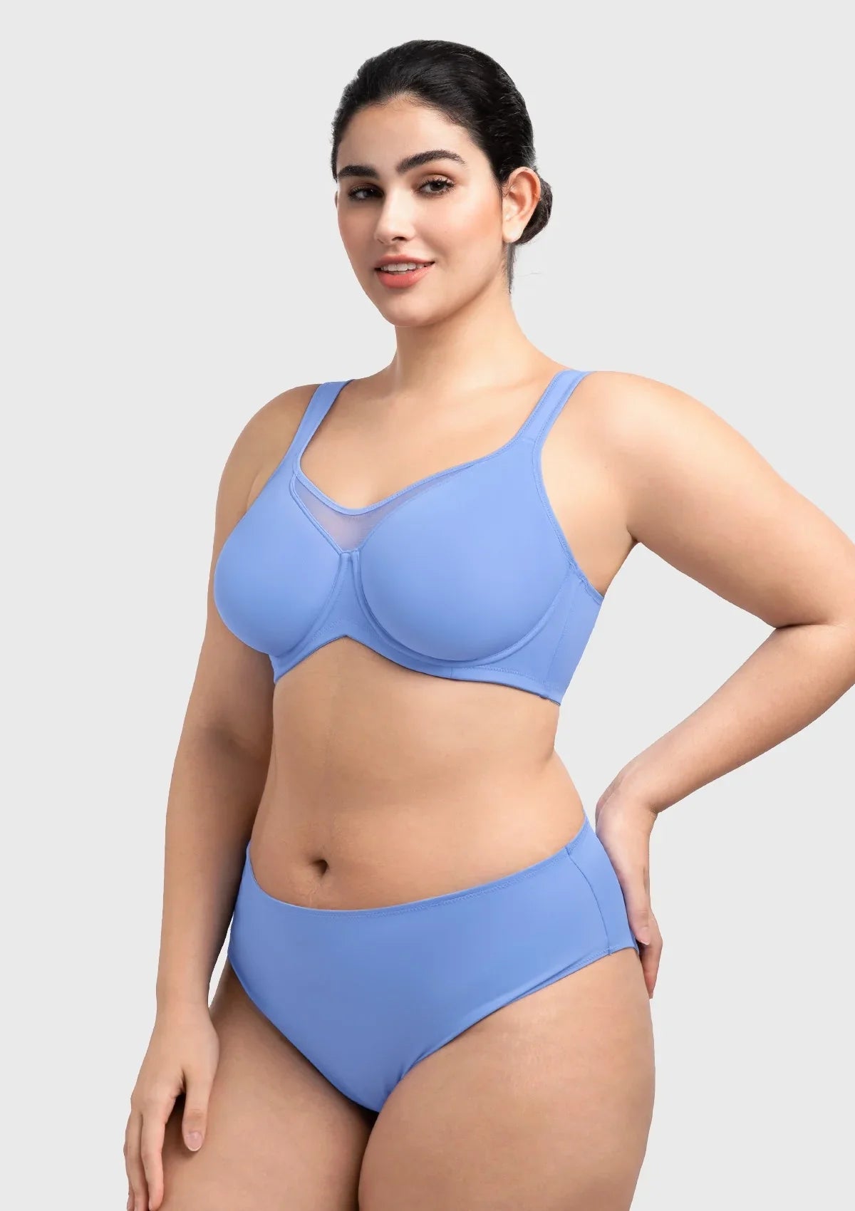 Side angle of the sky blue full cup minimizer bra, displaying the reinforced side slings that adjust beautifully with your movements.