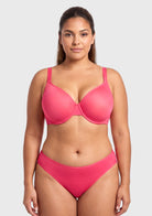Front view of model wearing the HSIA Knockout Pink Seraphina unlined underwire bra, featuring ultra-breathable sheer mesh and a flattering demi-cut design for a natural silhouette.
